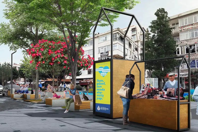 مردم در حال استراحت و خرید در پیاده&zwnj;رو خیابان بغداد در یک روز آفتابی